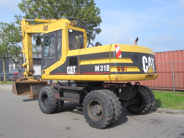 1999 CAT M 318